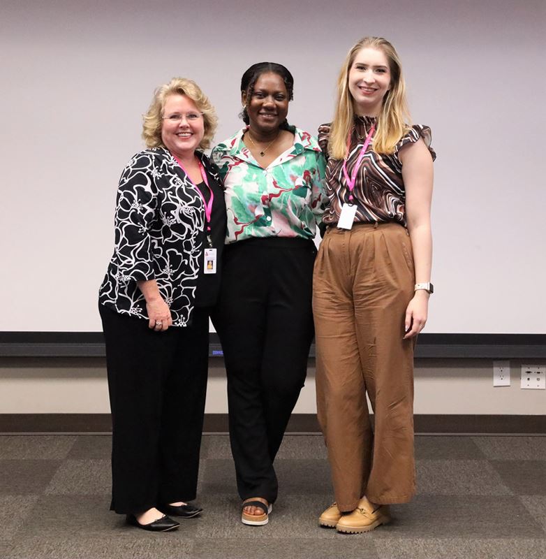 Group photo of three people