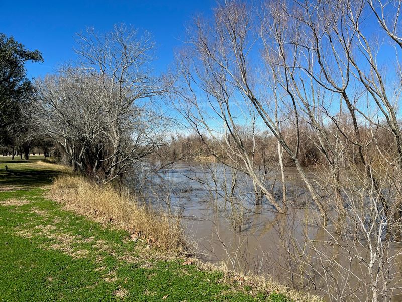 Guadalupe River is near its bank in Riverside Park