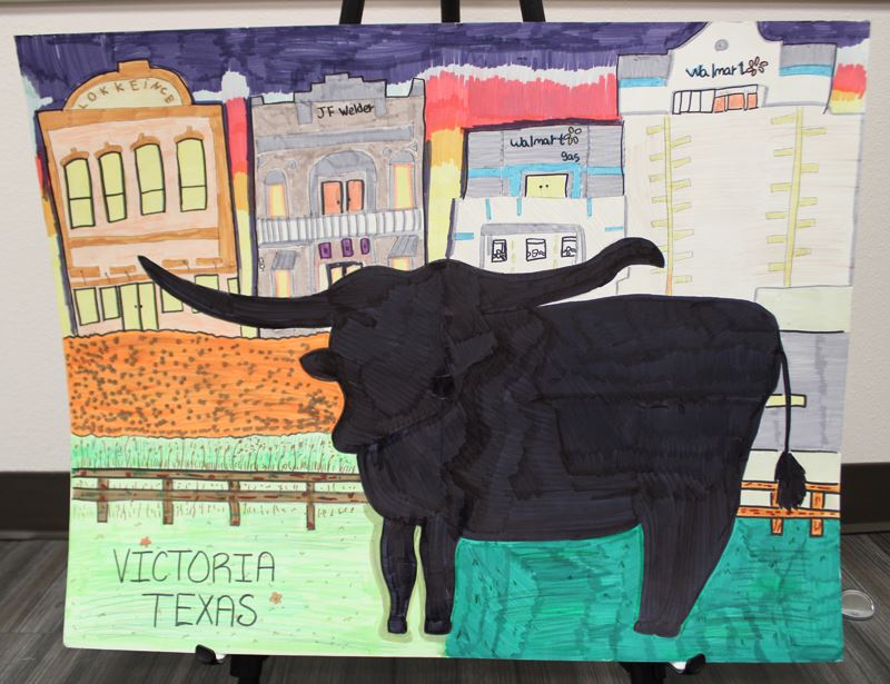 A silhouette of a longhorn steer with background historical on one side and modern on the other side