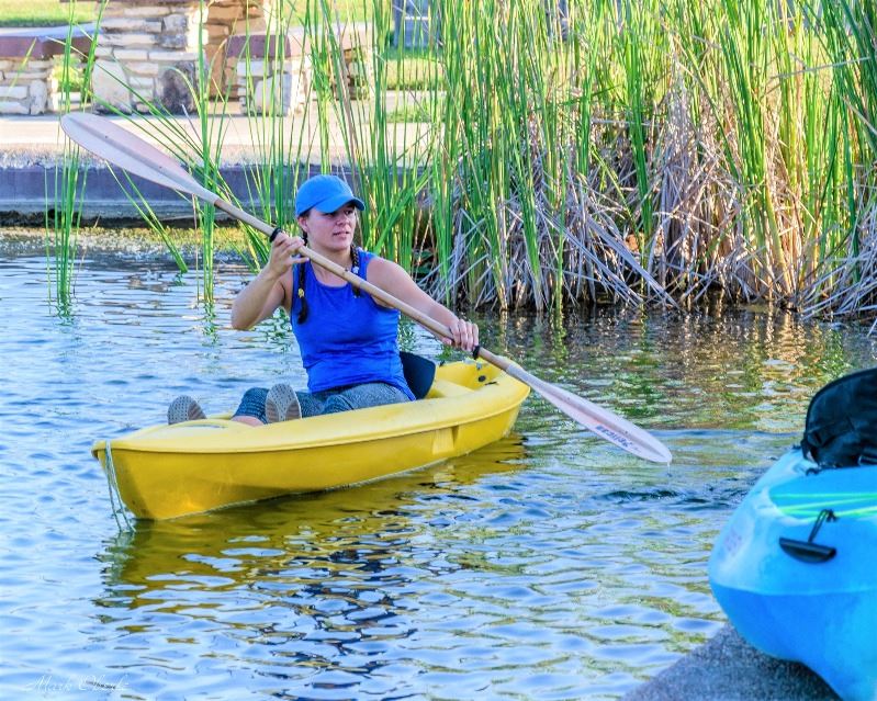 Gabby Anglin paddles in kayak