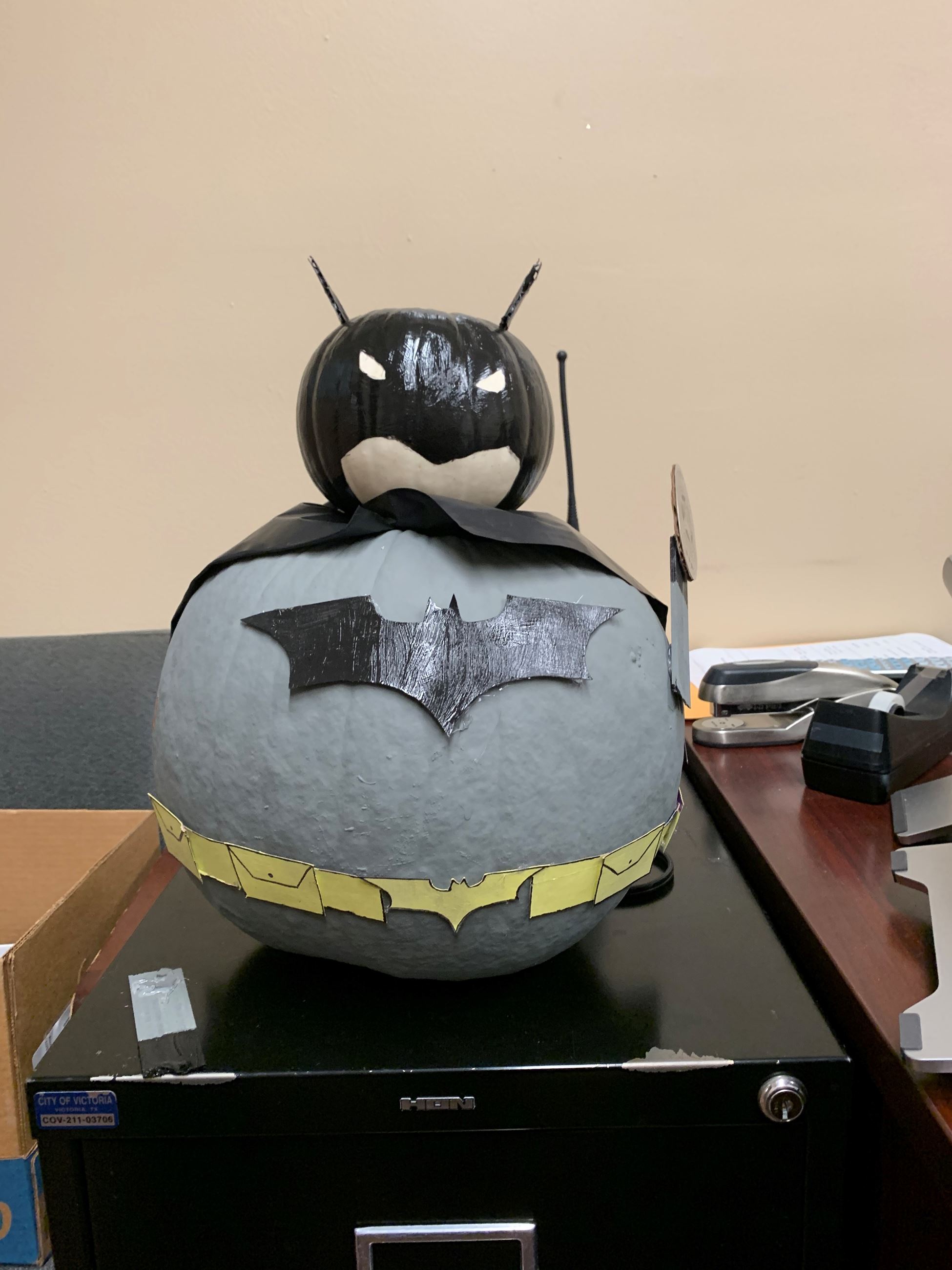 Batman figure made from two pumpkins