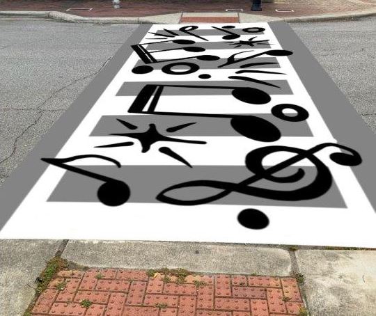 Mockup of a painted crosswalk featuring musical notes in downtown Victoria