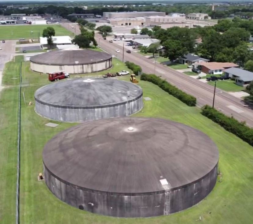 Dark-colored water tanks