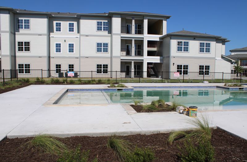Swimming pool in the courtyard of an apartment complex